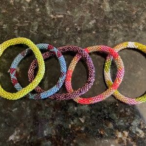 Set of 5 Nepal roll on beaded bracelets
